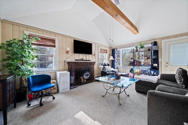 carpeted living room featuring wood walls, a brick fireplace, and vaulted ceiling with beams