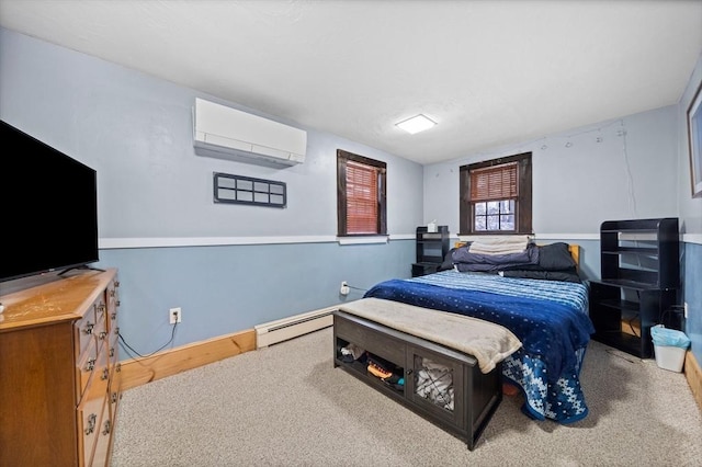 bedroom with baseboard heating, carpet, and a wall unit AC