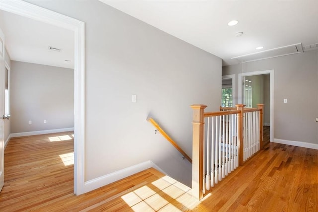 stairs featuring wood-type flooring