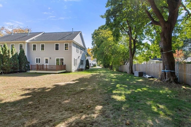 view of yard featuring a wooden deck