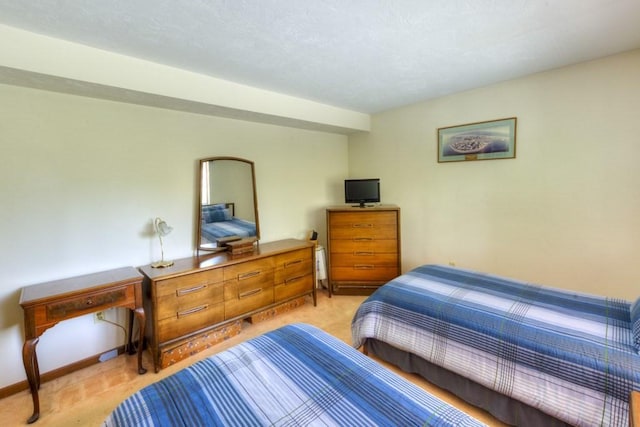 bedroom with baseboards