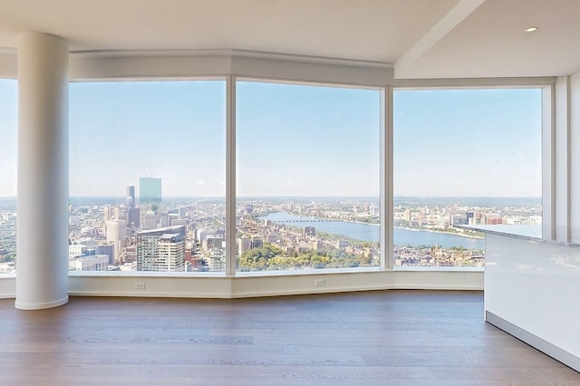 interior space featuring a water view and a healthy amount of sunlight