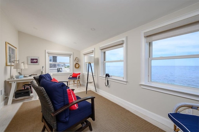 118 Oceanside Dr, Scituate, MA 02066 - sitting room featuring vaulted ceiling, baseboards, and a water view
