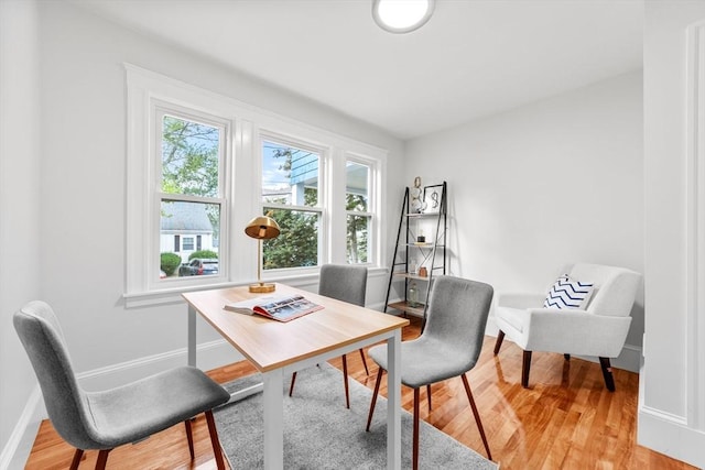 dining area featuring hardwood / wood-style floors