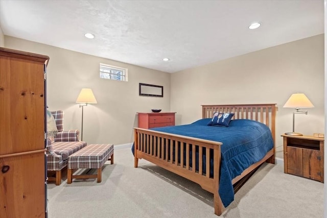 bedroom featuring recessed lighting, baseboards, and light colored carpet