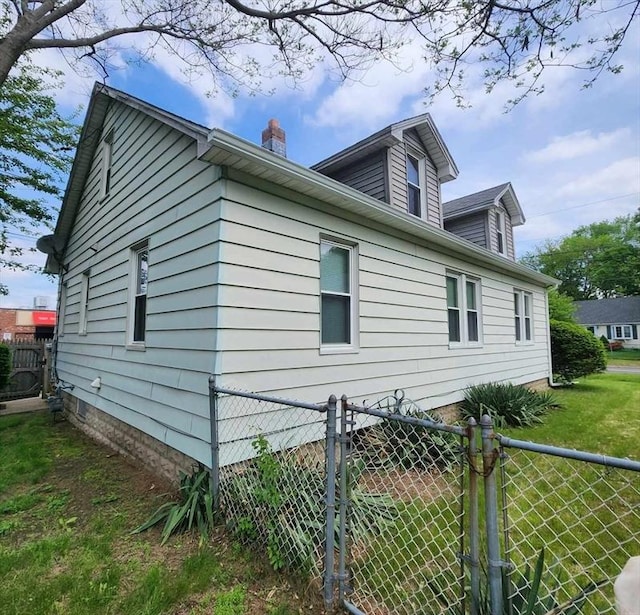 1774 Carew St, Springfield, MA 01104 - view of property exterior featuring a chimney