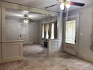 1774 Carew St, Springfield, MA 01104 - foyer with a ceiling fan, carpet floors, and baseboards