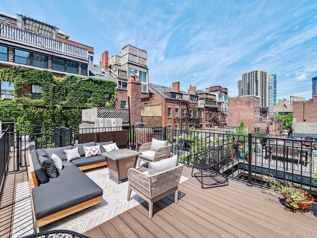 wooden deck with outdoor lounge area