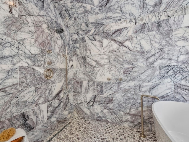 bathroom with tile walls