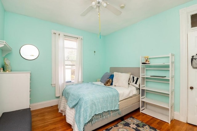 18 Dighton St Unit 18, Boston, MA 02135 - bedroom with wood finished floors, baseboards, and a ceiling fan