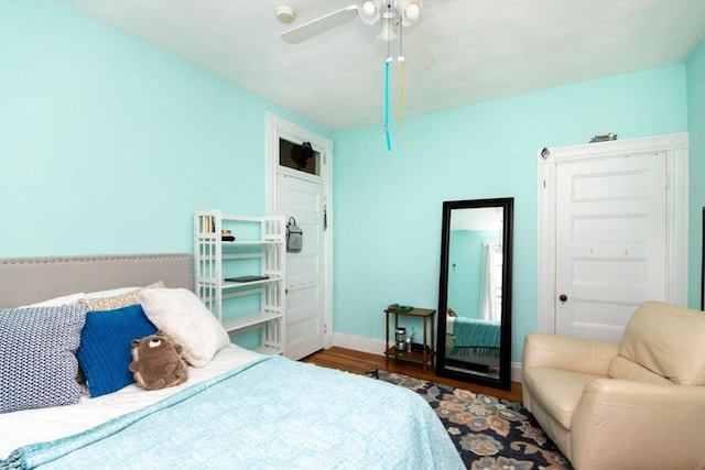 18 Dighton St Unit 18, Boston, MA 02135 - bedroom with wood finished floors, baseboards, and a ceiling fan