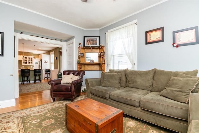18 Dighton St Unit 18, Boston, MA 02135 - living area featuring plenty of natural light, wood finished floors, and ornamental molding
