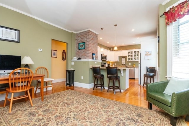 18 Dighton St Unit 18, Boston, MA 02135 - living room featuring light wood finished floors, crown molding, baseboards, and recessed lighting