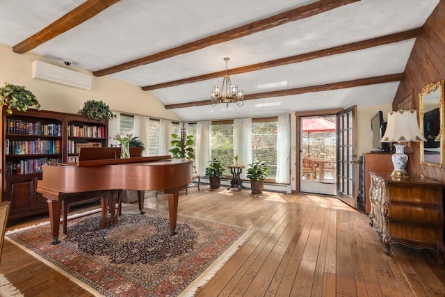interior space with an AC wall unit, lofted ceiling with beams, a chandelier, and hardwood / wood-style flooring