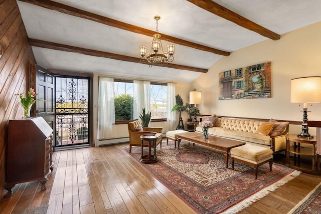 living room featuring lofted ceiling with beams, a baseboard heating unit, a notable chandelier, and hardwood / wood-style flooring