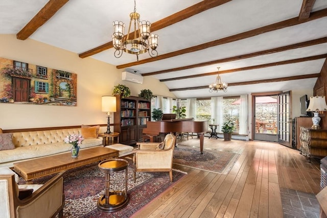 living area featuring an inviting chandelier, a wall unit AC, hardwood / wood-style floors, and beam ceiling