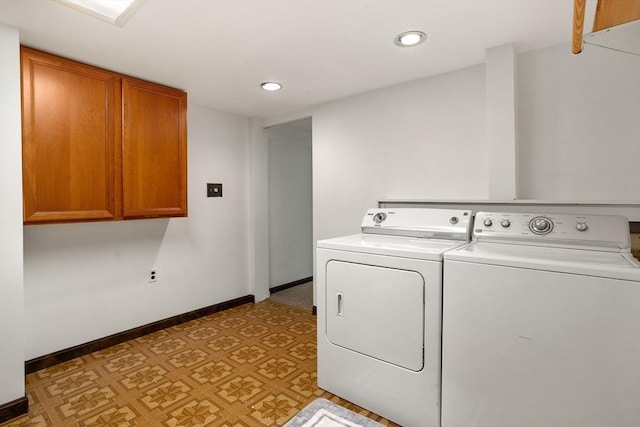 clothes washing area with light floors, recessed lighting, cabinet space, washing machine and dryer, and baseboards