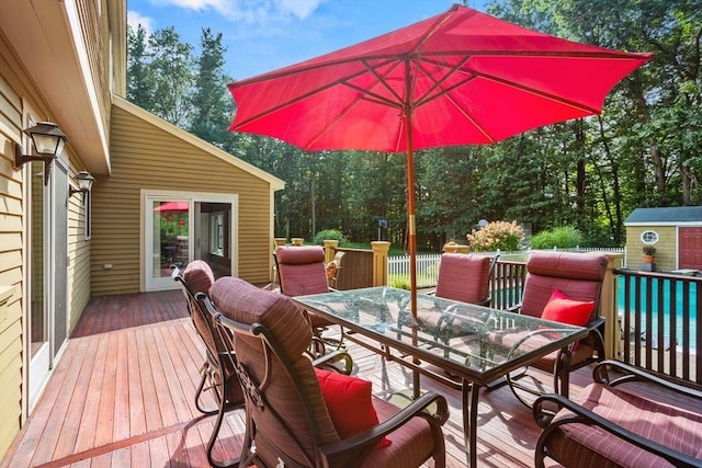 deck featuring outdoor dining area