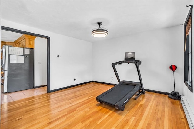 13 Old Gardner Rd, Westminster, MA 01473 - exercise area with baseboards, light wood finished floors, and baseboard heating