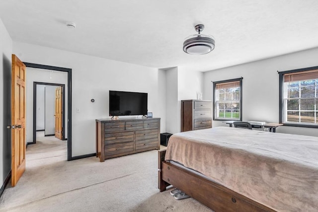 13 Old Gardner Rd, Westminster, MA 01473 - bedroom with light colored carpet, baseboards, and multiple windows