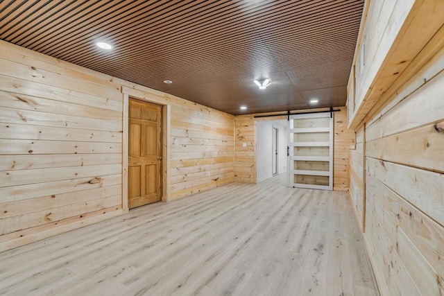 13 Old Gardner Rd, Westminster, MA 01473 - interior space with wooden walls, recessed lighting, a barn door, and wood finished floors