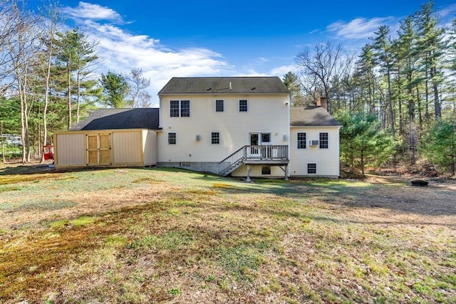 13 Old Gardner Rd, Westminster, MA 01473 - rear view of property featuring stairs, a wooden deck, an outbuilding, a chimney, and a yard