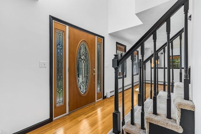 13 Old Gardner Rd, Westminster, MA 01473 - entryway featuring baseboards, a high ceiling, stairs, and wood finished floors