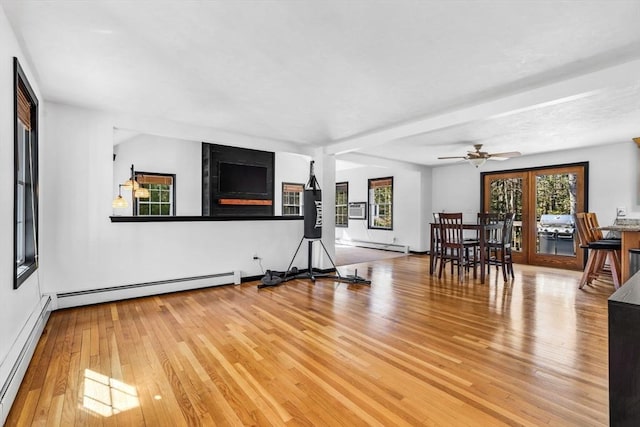 13 Old Gardner Rd, Westminster, MA 01473 - living area with a ceiling fan, a baseboard heating unit, hardwood / wood-style flooring, and a baseboard radiator