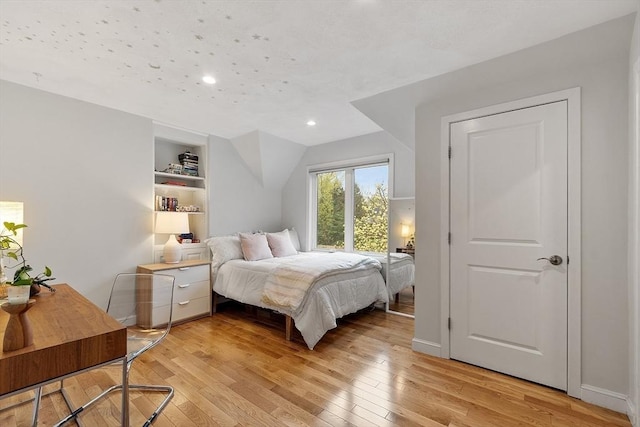 4 Greenfield Ln Unit 4, Concord, MA 01742 - bedroom with light wood finished floors and recessed lighting