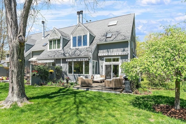 4 Greenfield Ln Unit 4, Concord, MA 01742 - rear view of property featuring outdoor lounge area, a lawn, a shingled roof, and a chimney