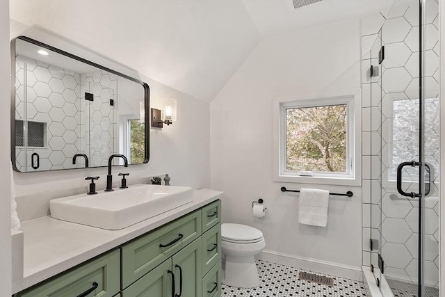 4 Greenfield Ln Unit 4, Concord, MA 01742 - full bath with lofted ceiling, vanity, a stall shower, toilet, and tile patterned floors