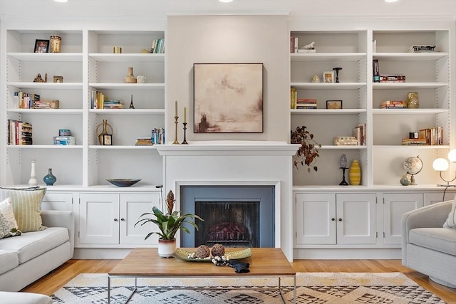 4 Greenfield Ln Unit 4, Concord, MA 01742 - living area featuring light wood-style floors and a fireplace