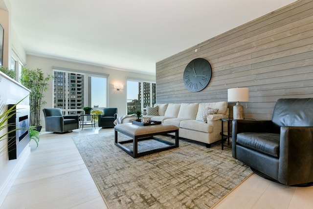 living room featuring light hardwood / wood-style flooring and plenty of natural light