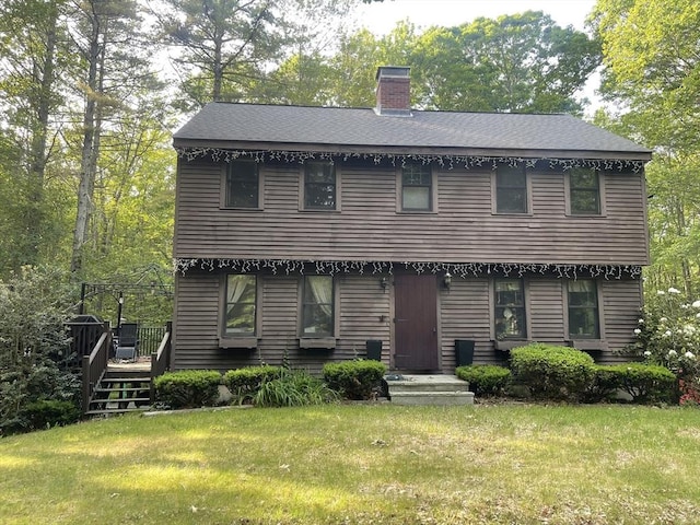 330 Arbor St, Lunenburg, MA 01462 - colonial inspired home with a chimney, a front yard, and a wooden deck