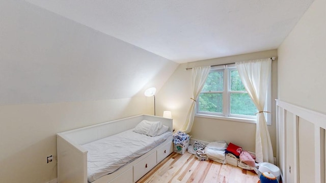 330 Arbor St, Lunenburg, MA 01462 - bedroom featuring light wood-style flooring and vaulted ceiling