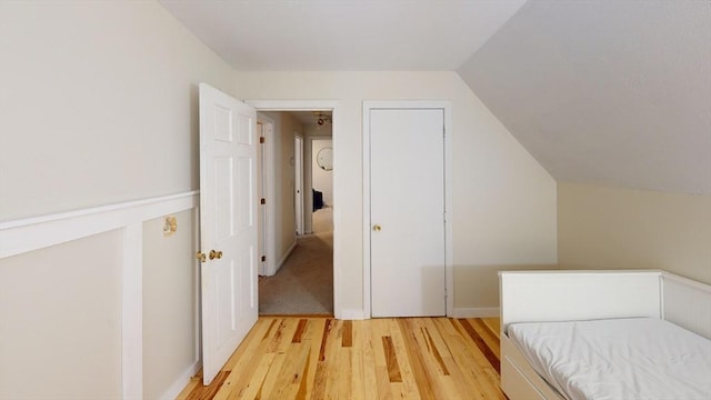 330 Arbor St, Lunenburg, MA 01462 - unfurnished bedroom featuring light wood-style flooring and vaulted ceiling
