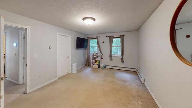 330 Arbor St, Lunenburg, MA 01462 - spare room featuring a textured ceiling, light carpet, and arched walkways