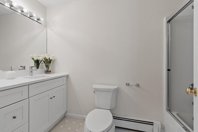 full bath with vanity, baseboards, a baseboard heating unit, and toilet