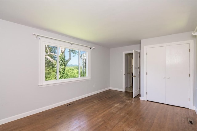 53 Iduna Ln, Amherst, MA 01002 - unfurnished bedroom with wood finished floors and a closet