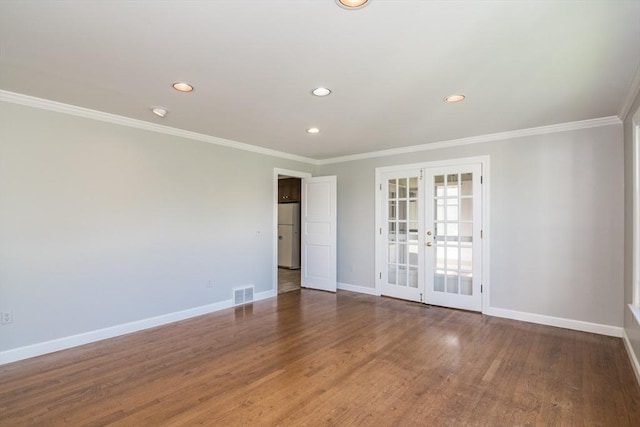 53 Iduna Ln, Amherst, MA 01002 - unfurnished room featuring french doors, recessed lighting, crown molding, and wood finished floors