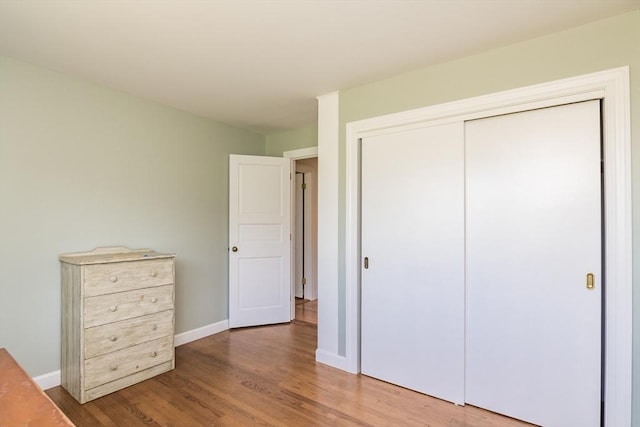 53 Iduna Ln, Amherst, MA 01002 - unfurnished bedroom with wood finished floors and a closet