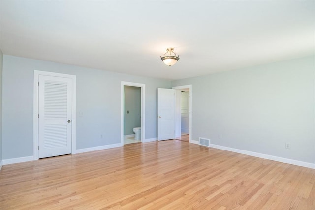 53 Iduna Ln, Amherst, MA 01002 - unfurnished bedroom featuring light wood-style floors and connected bathroom
