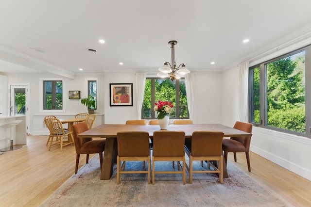 15 Park Ave, Newton, MA 02458 - dining area with light wood-style flooring, crown molding, recessed lighting, and baseboards