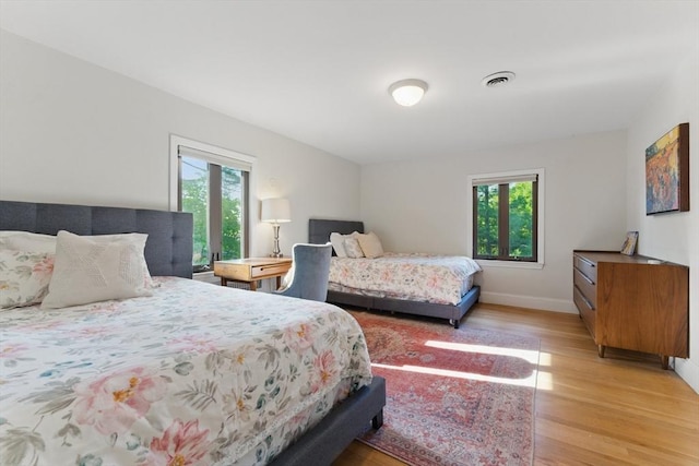 15 Park Ave, Newton, MA 02458 - bedroom featuring light wood finished floors and baseboards