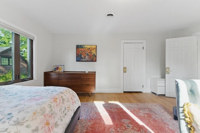15 Park Ave, Newton, MA 02458 - bedroom featuring light wood-style flooring and baseboards