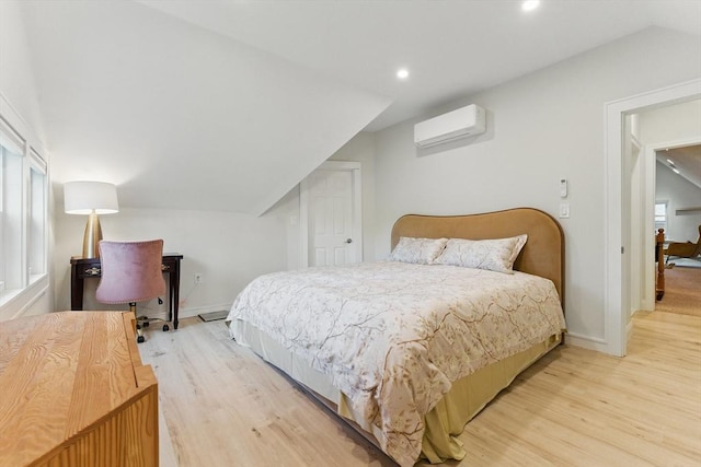 15 Park Ave, Newton, MA 02458 - bedroom featuring an AC wall unit, light wood-style flooring, baseboards, recessed lighting, and lofted ceiling