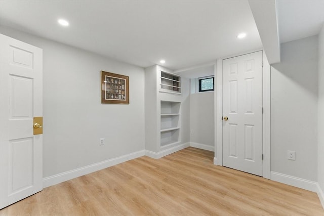 15 Park Ave, Newton, MA 02458 - unfurnished bedroom featuring light wood finished floors, baseboards, and recessed lighting