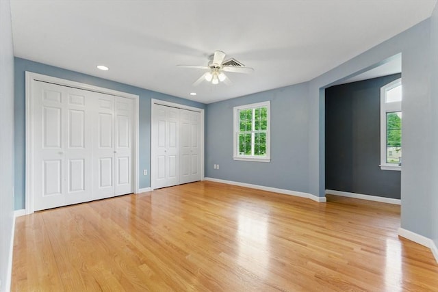 6 Willow Park, Wellesley, MA 02481 - unfurnished bedroom with two closets, light wood finished floors, baseboards, ceiling fan, and recessed lighting