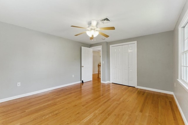 6 Willow Park, Wellesley, MA 02481 - unfurnished bedroom featuring baseboards, light wood-style flooring, a closet, and a ceiling fan
