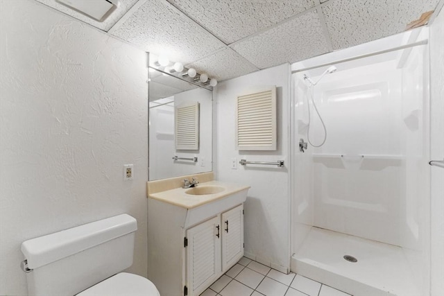 6 Willow Park, Wellesley, MA 02481 - bathroom with a shower stall, a paneled ceiling, toilet, vanity, and tile patterned flooring